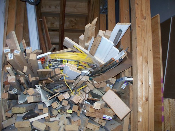 Lumber & stuff under stairs
